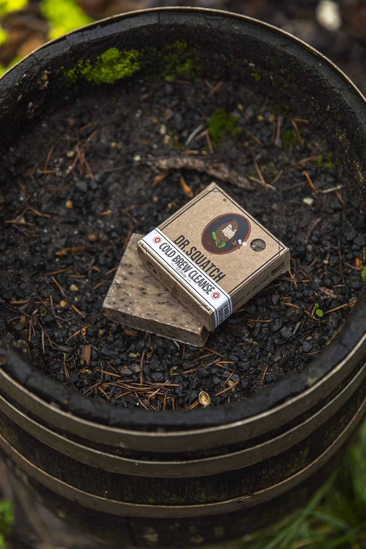 Dr. Squatch ingredients flatlay with shea butter, salt, clay and coffee benefits