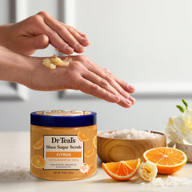Dr Teal's scrub on bathroom counter styled for an energizing morning routine