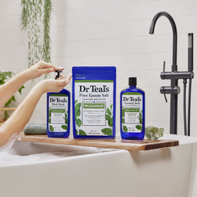 Dr Teal's bottle on a bathroom shelf staged for a refreshing shower routine