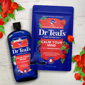 Dr Teal's salt with essential oil bottles arranged to show scent profile