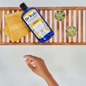 Dr Teal's ingredients shot with lemon balm emphasizing microbiome support
