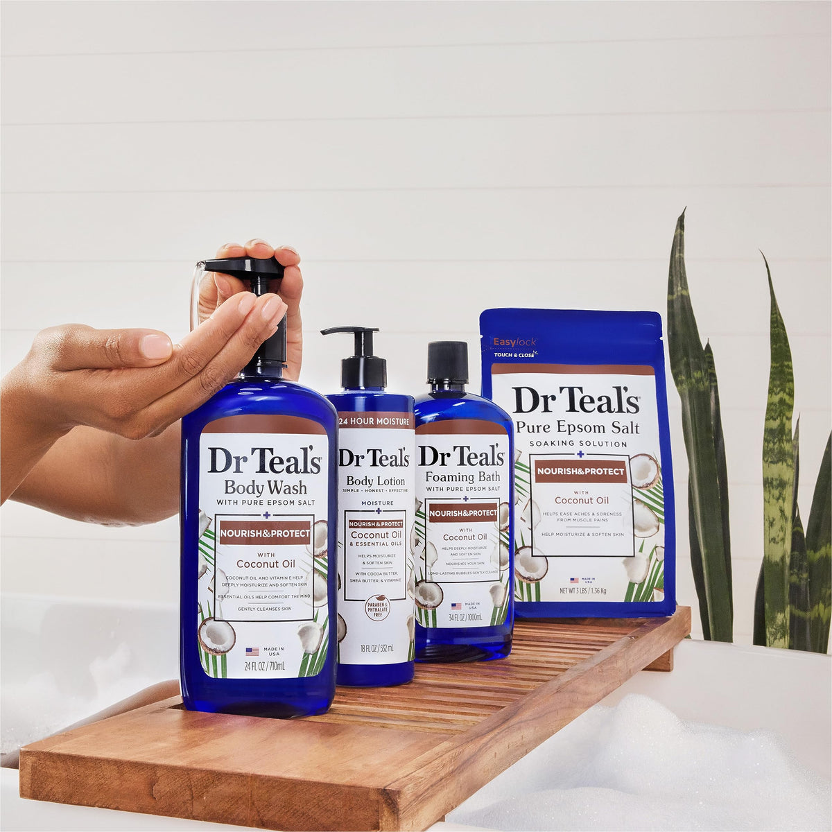 Person applying Dr Teal's lotion at sink to show easy daily use and fast absorption