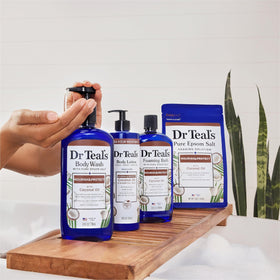 Person applying Dr Teal's lotion at sink to show easy daily use and fast absorption