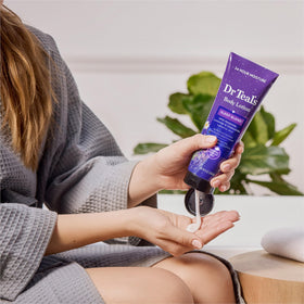 Dr Teal's lotion applied on arm demonstrating fast absorption benefit