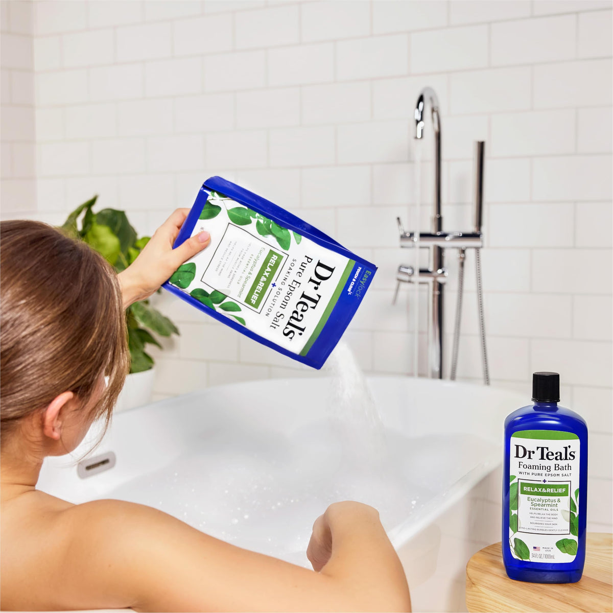 Dr Teal's products arranged in a bath setting conveying relaxation benefit