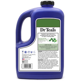 Dr Teal's eucalyptus and spearmint leaves beside bottle highlighting invigorating scent