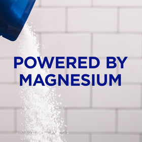 Dr Teal's scoop of Epsom salt close-up, highlights easy usage and purity