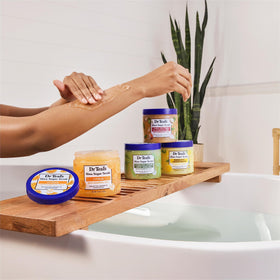 Dr Teal's scrub in shower setting showing in-use calming and cleansing benefit