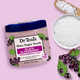 Arrangement of ingredient bottles with Dr Teal's shows natural oil benefits