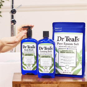 Dr Teal's bottle next to a ruler for scale showing true 24 fl oz size