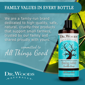 Two 32 fl oz Dr. Woods bottles beside a measuring cup to illustrate generous size