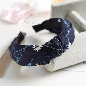 DRESHOW headbands on dresser to show styling and organization benefit