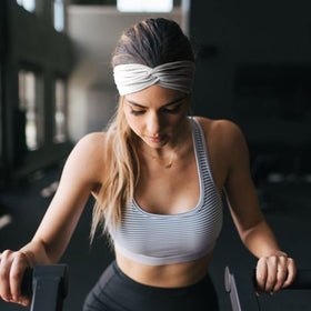DRESHOW model wearing headband with long hair showing secure hold benefit