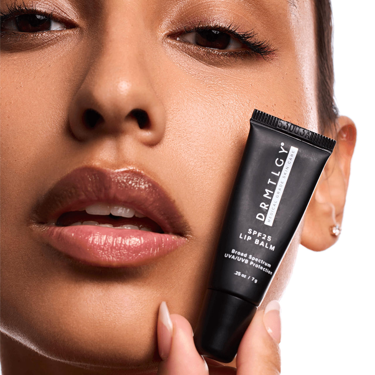 DRMTLGY application on lips demonstrating non-sticky glide and softened look