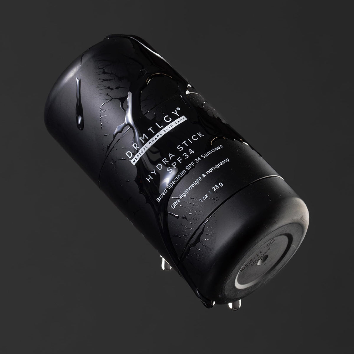 DRMTLGY hydra stick body shoulder application illustrating water-resistant outdoor protection