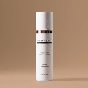 DRMTLGY applying serum to face for immediate plumping and smoothness