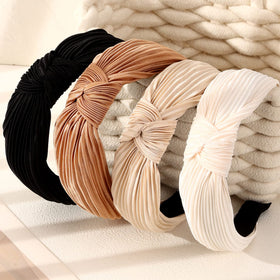 Drnytunk headband worn with ponytail demonstrating secure non-slip hold