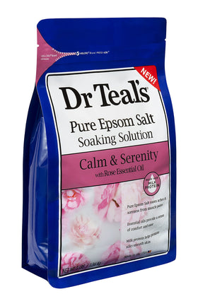 Dr.Teal's 3 lb salt and 34 fl oz bottle held for size comparison convenience