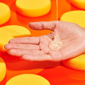 Drunk Elephant gel texture on hand demonstrating lightweight rinse-off benefit