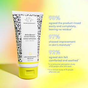 Drunk Elephant cleanser in hand being massaged onto skin to remove makeup and sunscreen gently