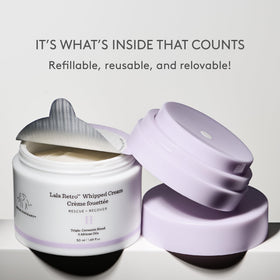 Drunk Elephant cream being dabbed on skin, shows fast absorption and hydration