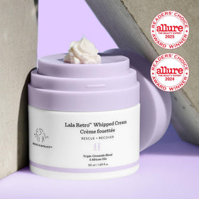 Drunk Elephant whipped cream texture swipe displaying lightweight spreadability