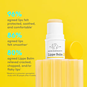 Drunk Elephant Lippe Balm tube closeup highlighting label and applicator detail