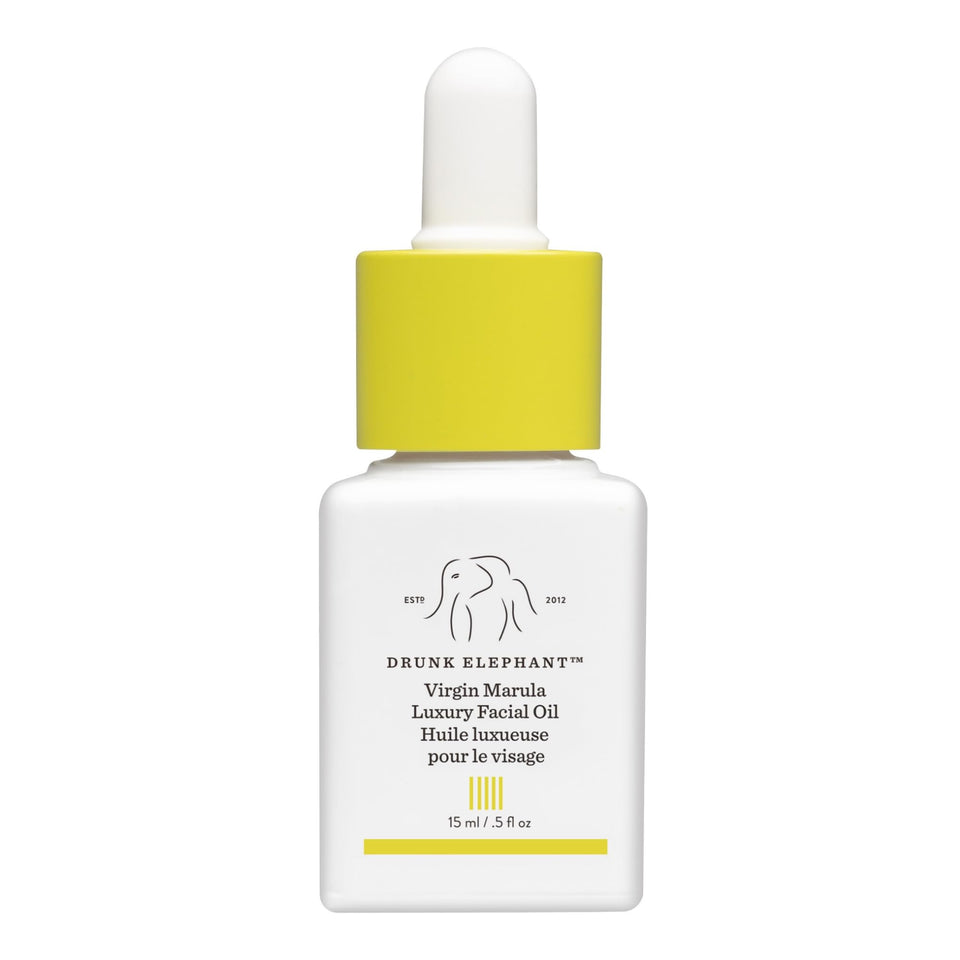 Drunk Elephant bottle front packaging showing compact 15 ml size and benefit