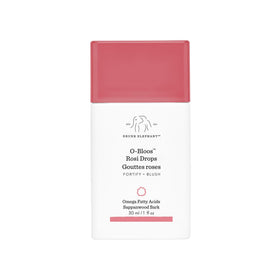 Drunk Elephant front bottle shot showing peachy-pink serum and clean packaging benefit