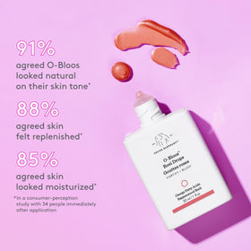Drunk Elephant mixed into moisturizer on hand, showing customizable tinting benefit