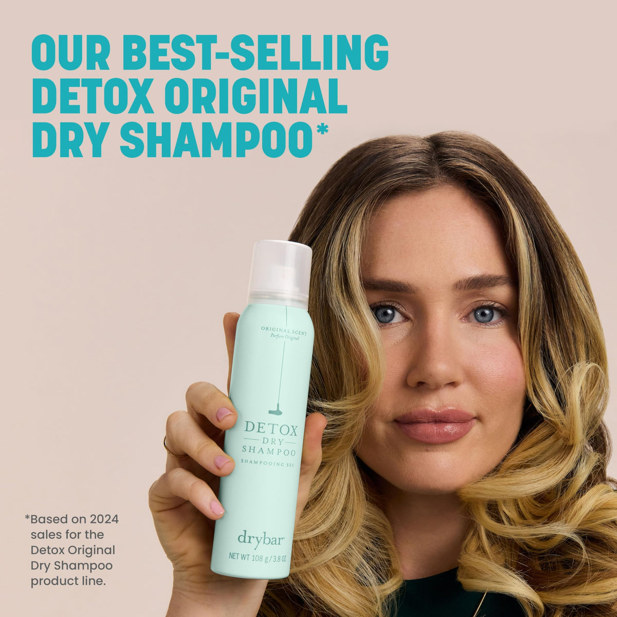 Drybar bottle on bathroom counter among styling tools showing convenient at-home refresh