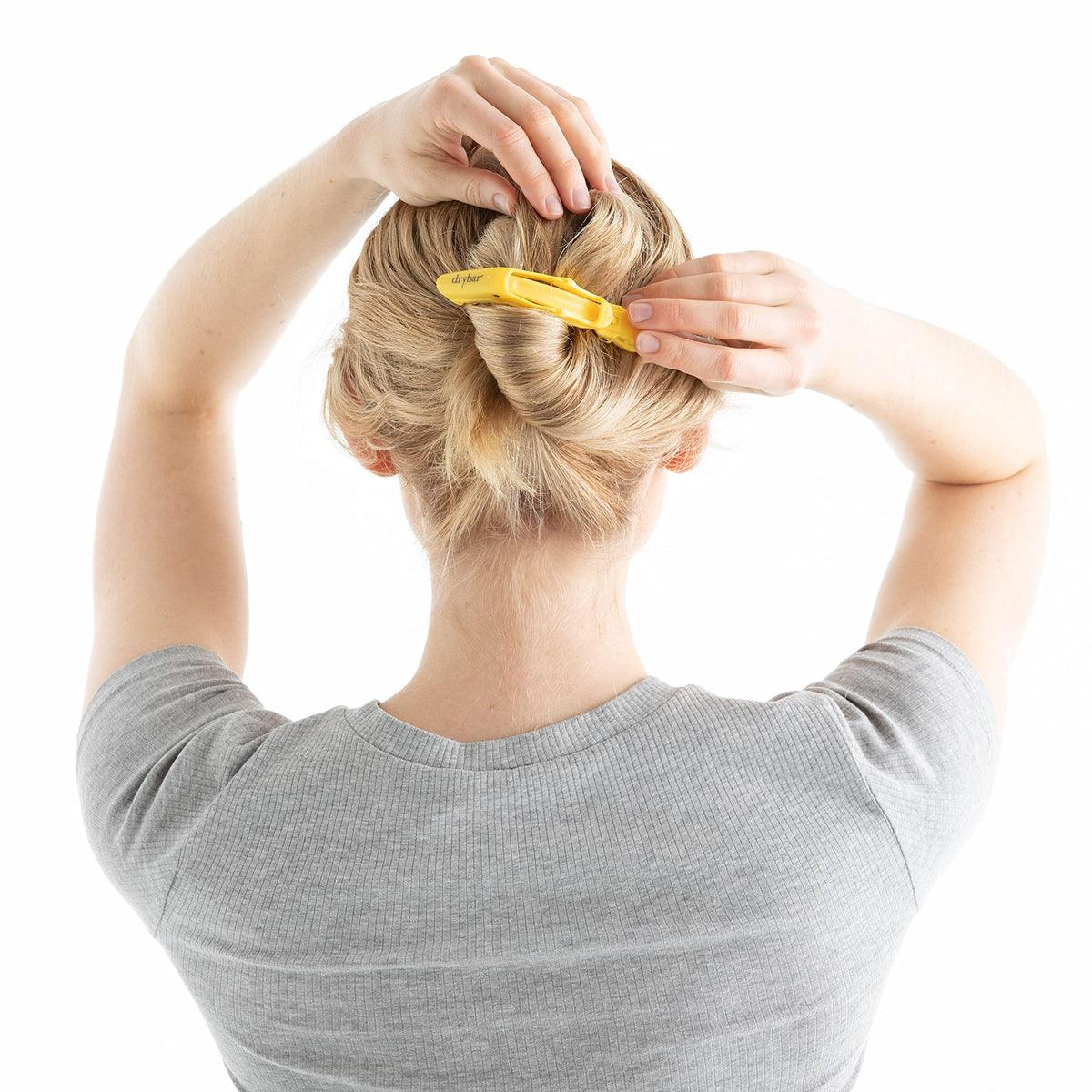 drybar Hold Me clips securing hair during blow-dry for faster, neater styling
