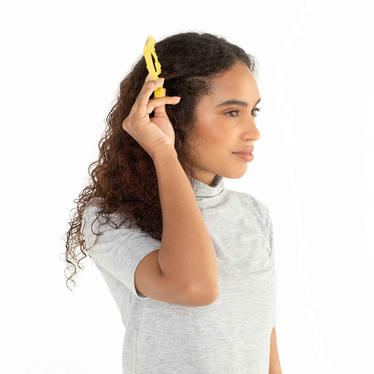 drybar Hold Me jointed arm close-up demonstrating adjustable hold for varied sections