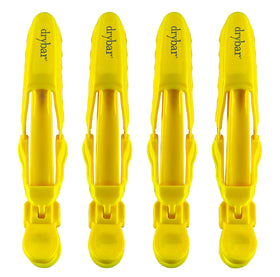 drybar Hold Me clip held in hand showing scale and easy maneuverability benefit