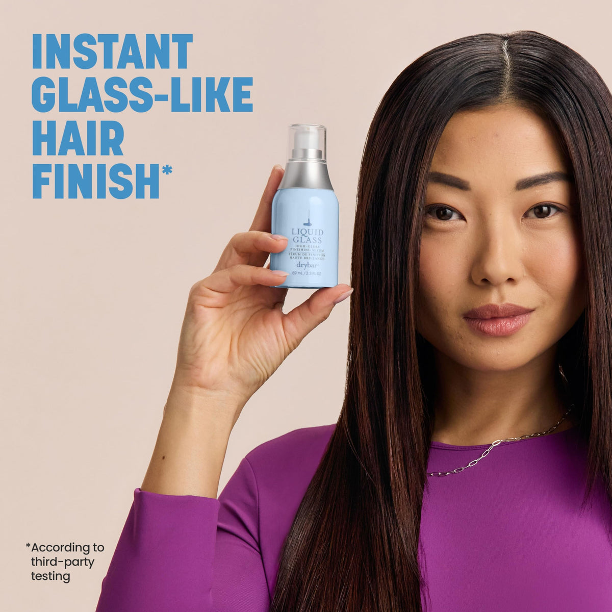 Drybar Liquid Glass on bathroom counter with styling tools for post-blowout use
