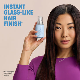 Drybar Liquid Glass on bathroom counter with styling tools for post-blowout use