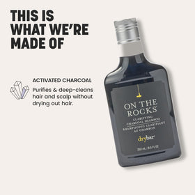 Drybar on the Rocks label detail highlighting charcoal and protein ingredients benefit