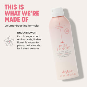 Drybar can in hand to show size and travel-friendly benefit