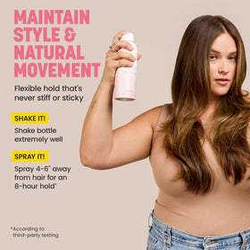 Drybar bottle held in hand to show scale and travel-friendly size