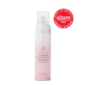 Close-up of hair texture with marula oil shine showing smoother, frizz-reduced finish