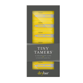 Drybar Tiny Tamers close-up of flat clip face illustrating even pressure and crease prevention