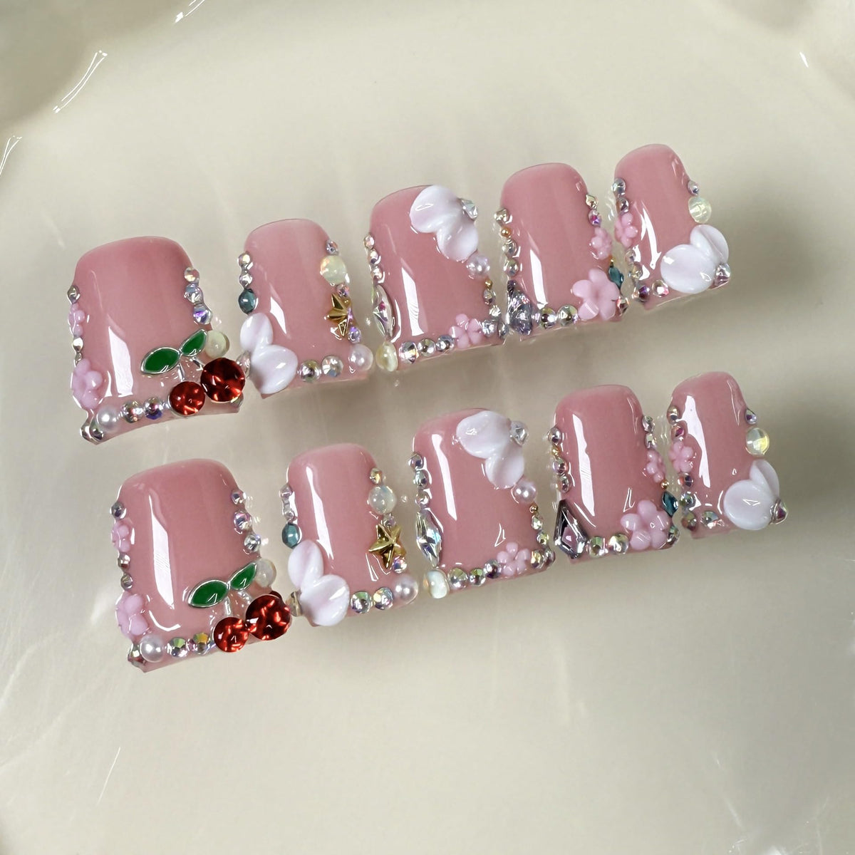 Duck pearl and rhinestone detail emphasizing sparkle and refined finish