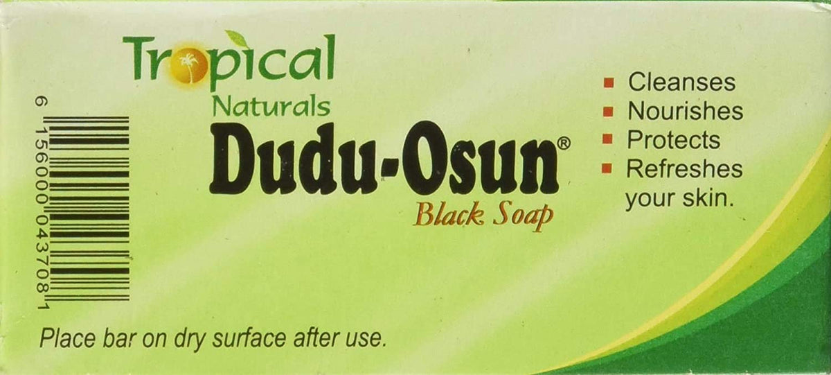 Dudu-Osun lather in hand illustrating rich foam and cleansing benefit