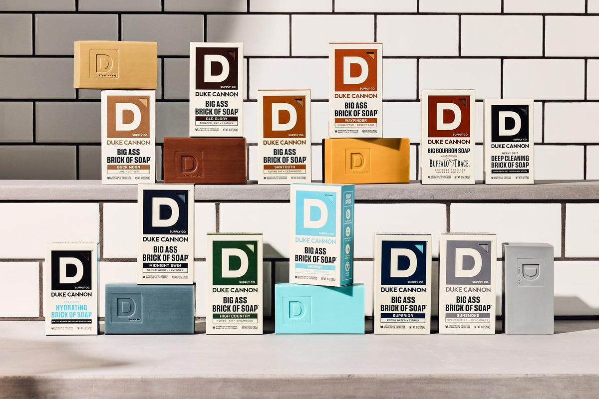 Duke Cannon soaps styled in bathroom showing rugged aesthetic and daily-use appeal