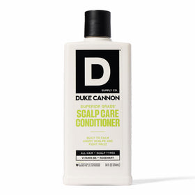 Duke Cannon bottle front view showing label and 14 oz size for clear identification