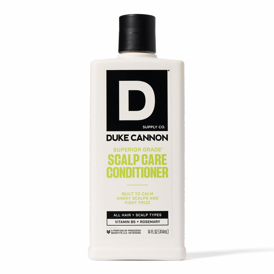 Duke Cannon bottle front view showing label and 14 oz size for clear identification