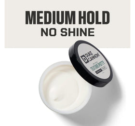 Duke Cannon open tub displaying matte putty texture for easy application