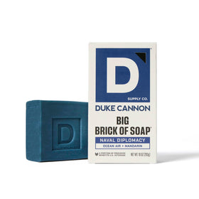 Duke Cannon bar in shower producing rich suds to show effective daily cleansing