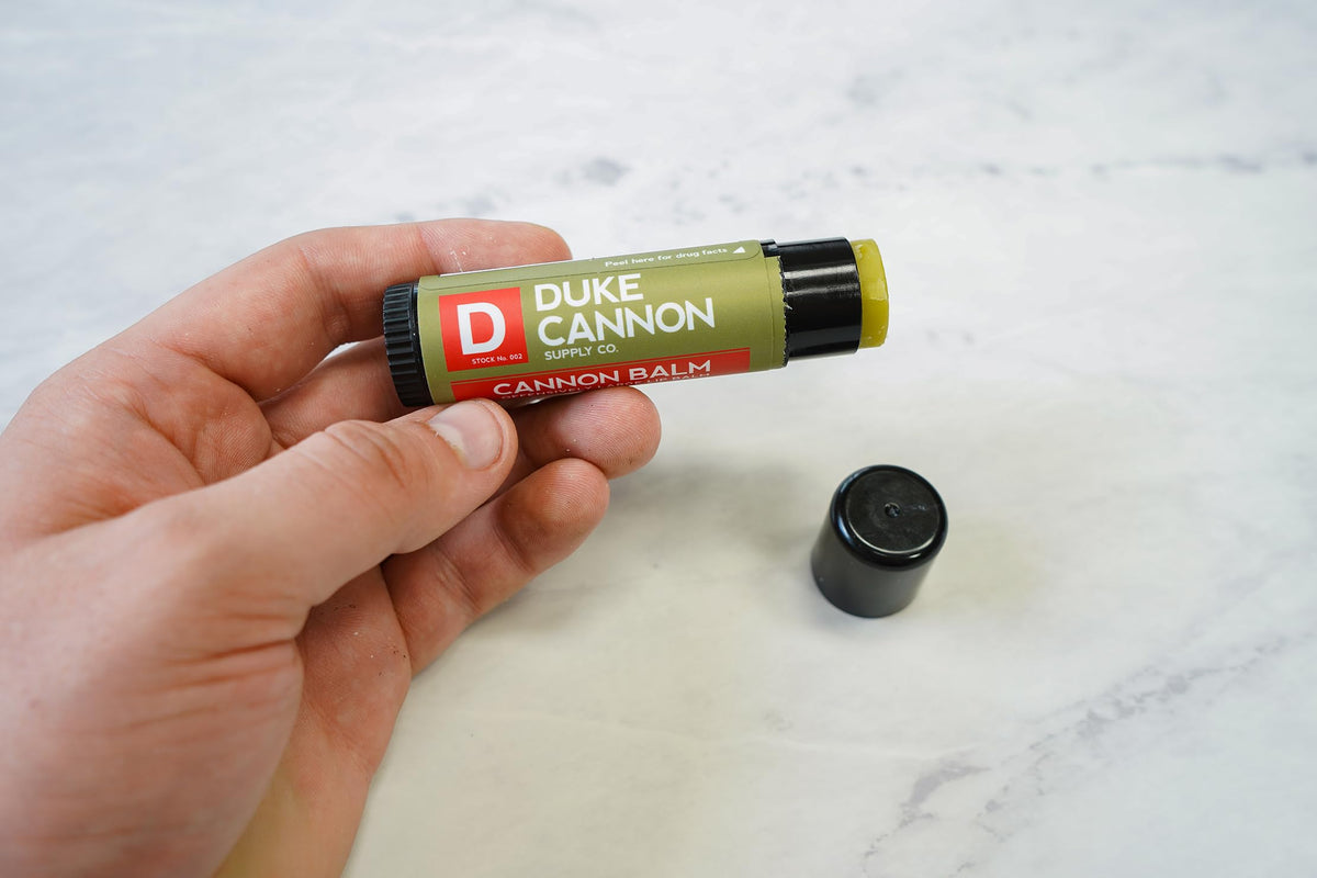 Duke Cannon ingredient label close-up showing beeswax, coconut, and shea butter