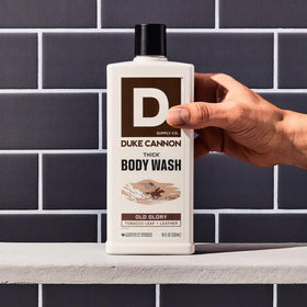 Duke Cannon rich lather on washcloth showing deep-cleaning exfoliation